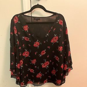 Lane Bryant flour print blouse with quarter bell sleeve. Like new